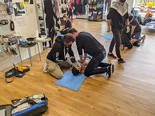 people practicing CPR in a CPR training course